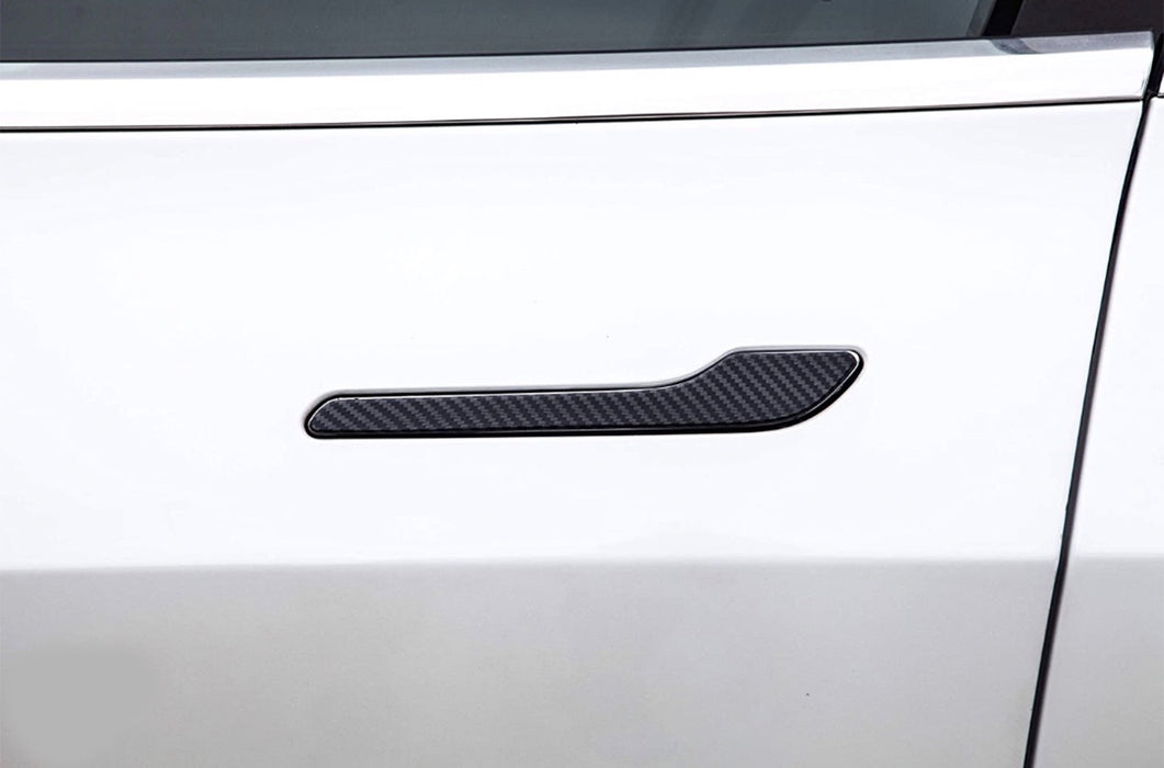 Door handle protection vinyl with carbon fiber texture.
